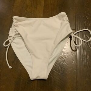 Woman’s cute white bathing suit bottoms!